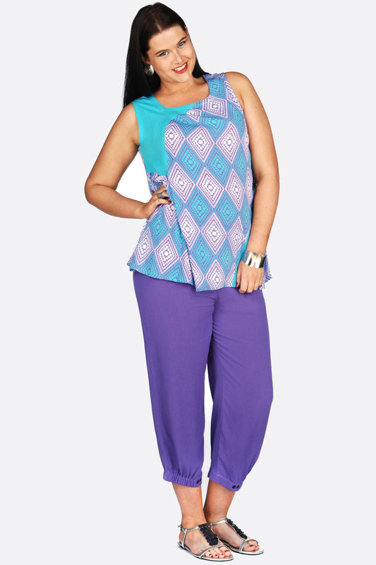 Kita Ku Aquarius sleeveless tunic featuring a relaxed fit and vibrant print, perfect for casual summer wear.