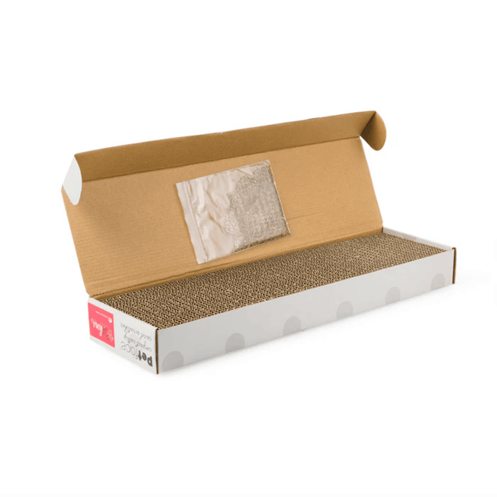 Grey open box showing cardboard interior and corrugated cardboard scratcher inside on a white background.