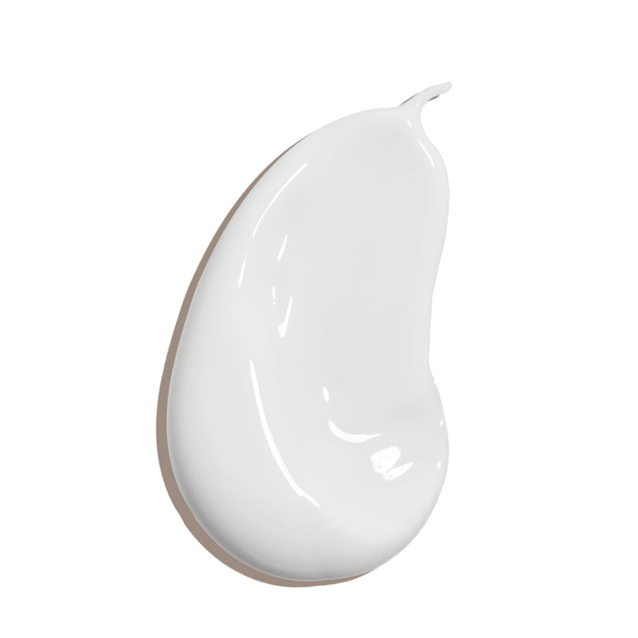 White creamy lotion texture sample representing Classic Body Organic Sunscreen Lotion SPF 30 - Tropical Coconut | COOLA for skincare and body care use.
