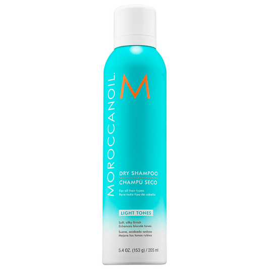 Bottle of Dry Shampoo for Light Tones | Moroccanoil with turquoise and white design, featuring the brand name and product details for enhancing blonde tones and providing a soft, silky finish.
