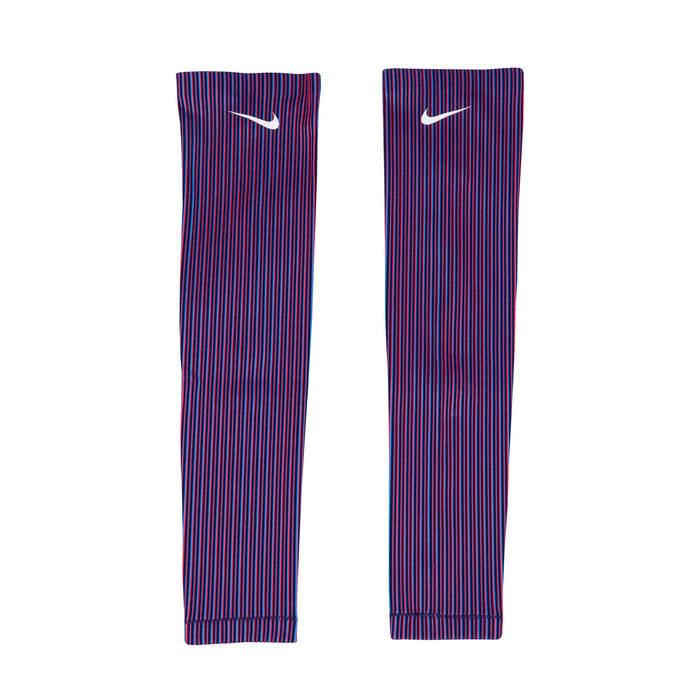 A pair of Nike Team USA women's armsleeves in red and blue striped pattern with the Nike logo on the upper part.