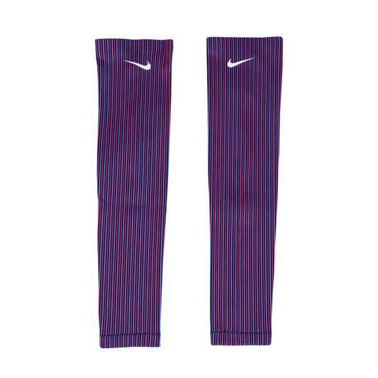 A pair of Nike Team USA women's armsleeves in red and blue striped pattern with the Nike logo on the upper part.