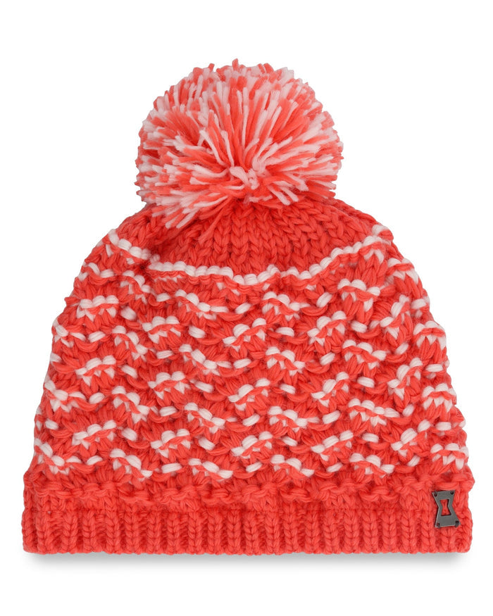 Red knitted beanie with white pattern and pom-pom on a white background